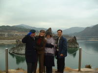 Left to right: John, Vanessa, Julie, and Uncle Choi in front of 
